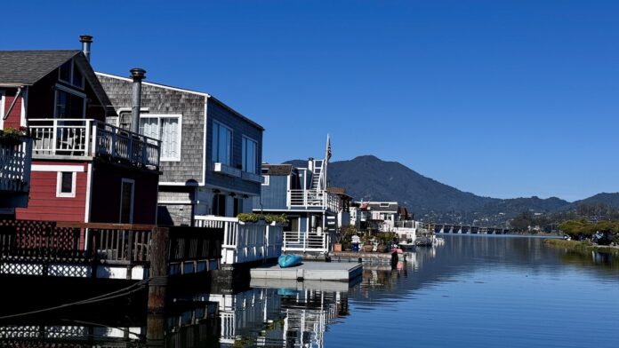 Sausalito houseboats on a sunny day in winter with Mt Tamalpais in background